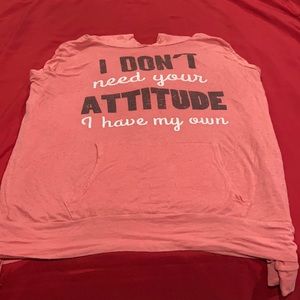 Light pink hooded top.